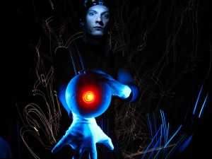 Alvin Sputnik holding red glowing ball