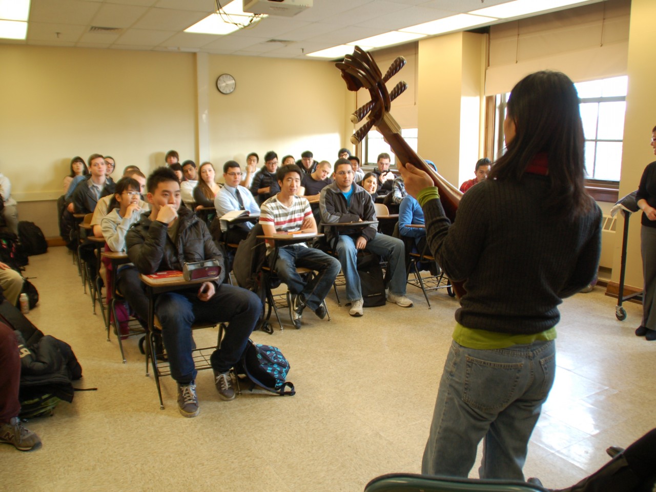 Wu Man gives a Purdue class a demonstration of the pipa