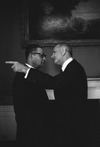 President Johnson and Louis Martin at the reception for Democratic National Committee Delegates, April 20, 1966