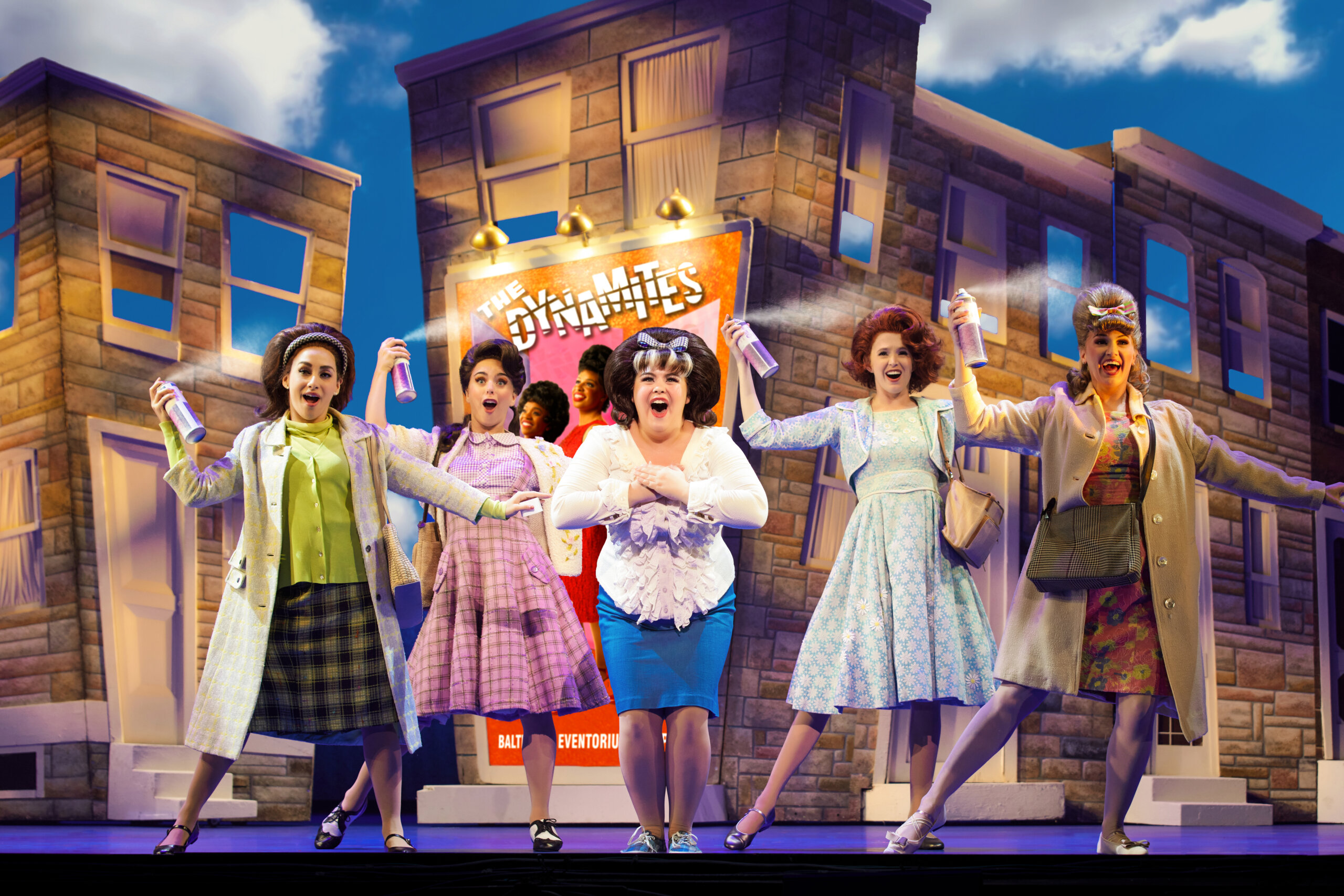(center) Niki Metcalf as “Tracy Turnblad” and the Company of Hairspray. Photo: Jeremy Daniel.