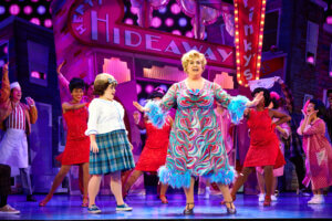 “Welcome to the 60s” (Nov 23) - (from L) Caroline Eiseman as “Tracy Turnblad,” Greg Kalafatas as “Edna Turnblad” and Company in Hairspray. Photo: Jeremy Daniel.