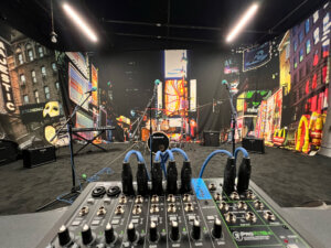 Sound board, keyboard, microphones and drum kit in the JamSpace music rehearsal space at Elliott Hall of Music