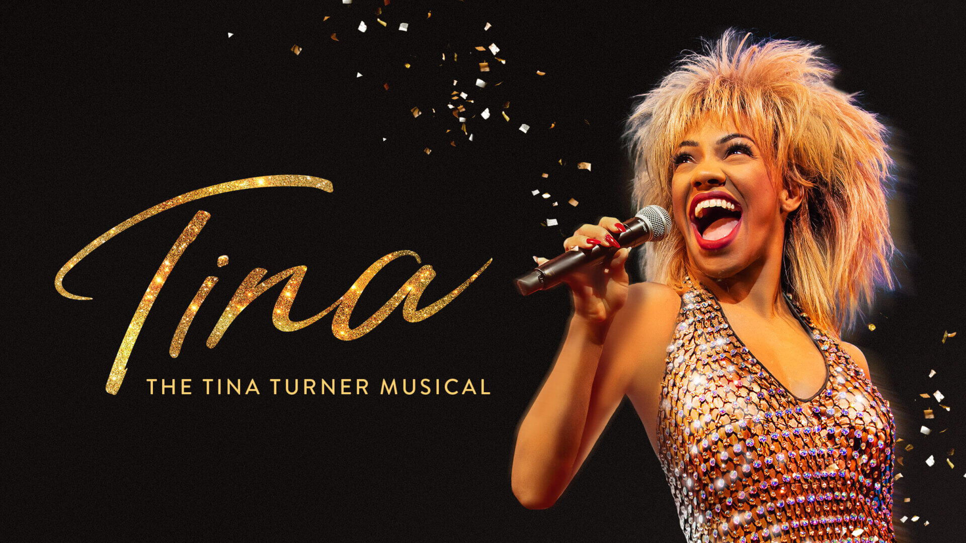 TINA - The Tina Turner Musical with actress playing Tina Turner, singing into microphone