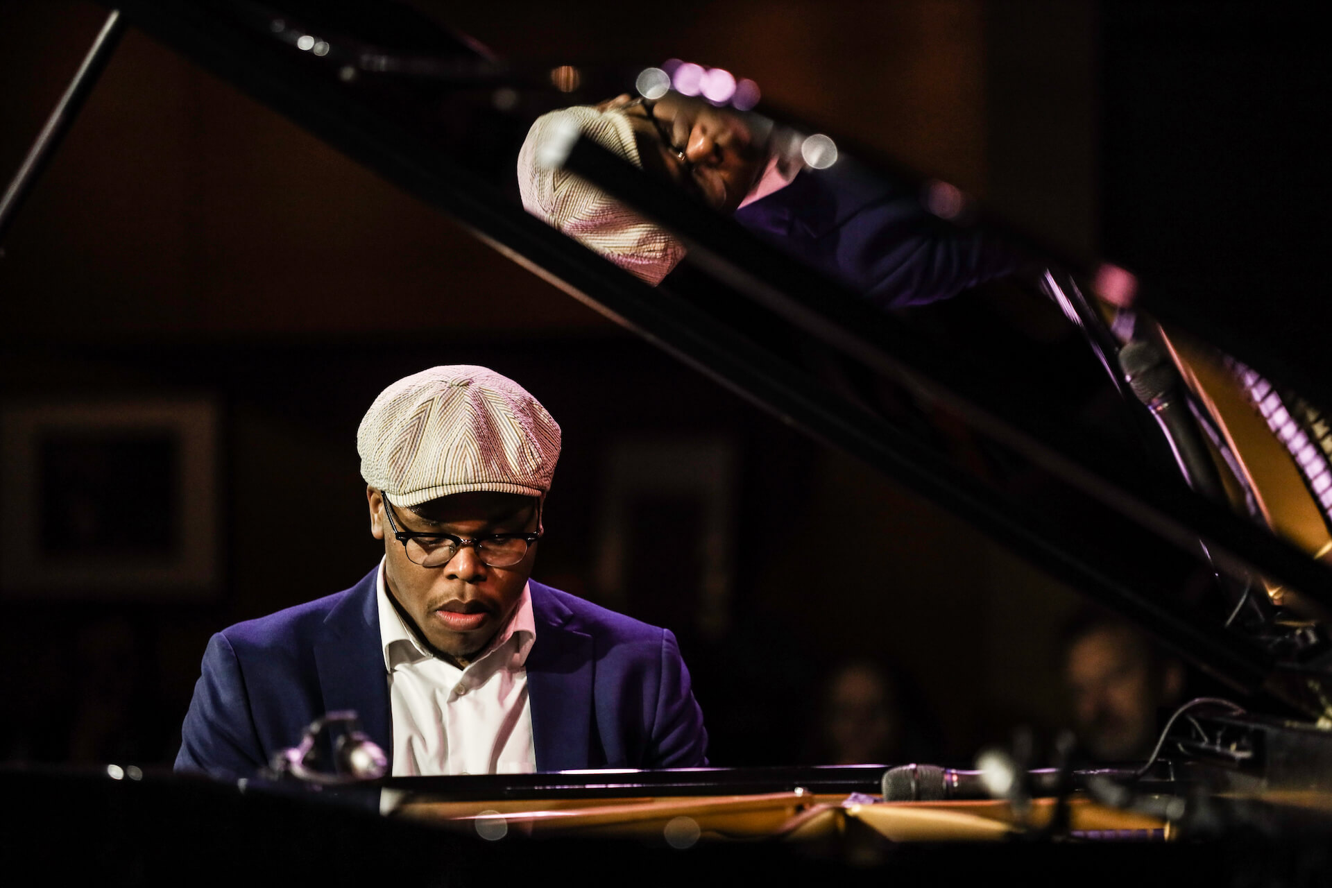 Isaiah J. Thompson playing piano