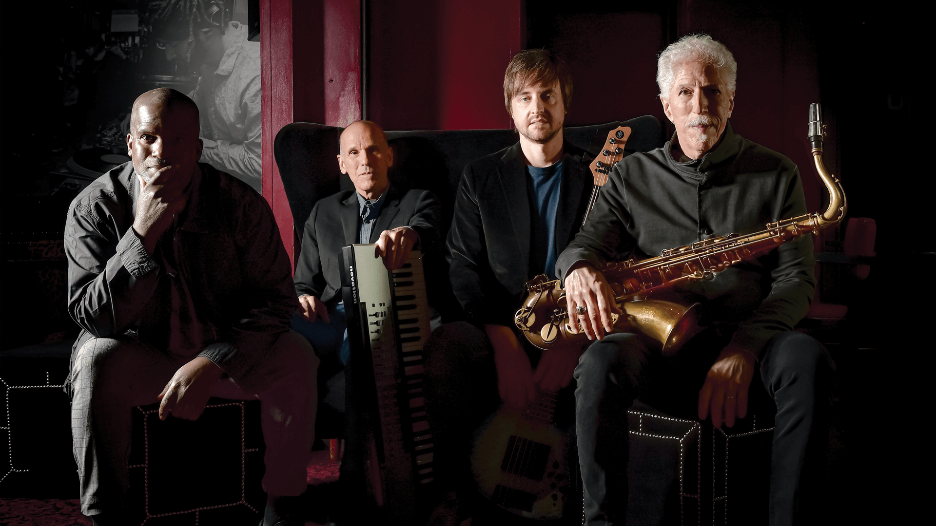 Yellowjackets sitting with saxophone