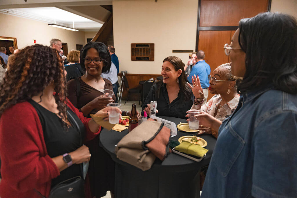 Friends of Convos enjoying food and beverages during Club Convos