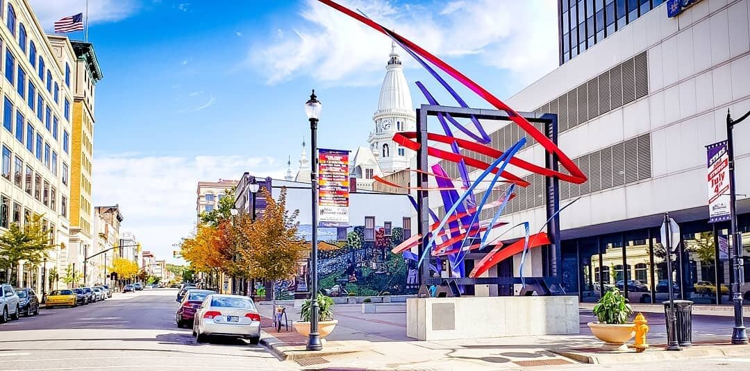 View of Main Street, Downtown Lafayette, Indiana with sculpture in the foreground
