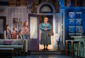 Alanis Sophia (Lydia Hillard), Chance Challen (Christopher Hillard), Vivian Atencio (Natalie Hillard), Melissa Campbell (Miranda Hillard), and Craig Allen Smith (Euphegenia Doubtfire).
Photo by Joan Marcus.
