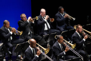 Trumpets and Trombones, including Wynton Marsalis. Photo credit: Luigi Beverelli