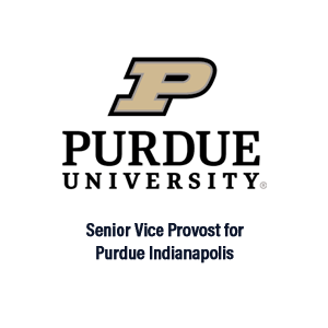 Purdue University logo above the text Senior Vice Provost for Purdue Indianapolis on a light gray background, styled with a touch of Mucca Pazza flair.