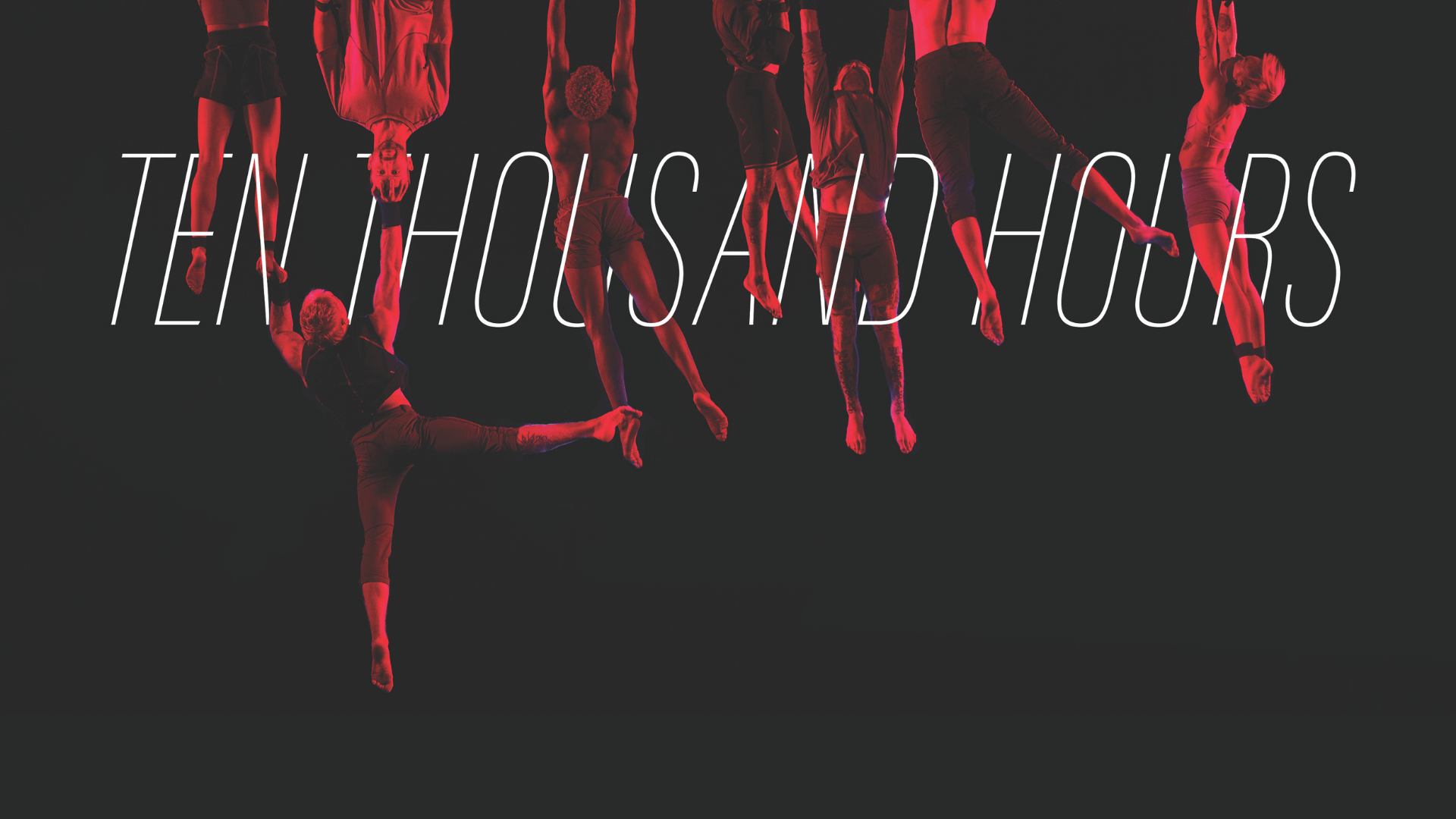 Seven people hang upside down in red light against a black background, with large white text overlaid reading TEN THOUSAND HOURS, evoking a sense of Great Expectations and the relentless pursuit of mastery.